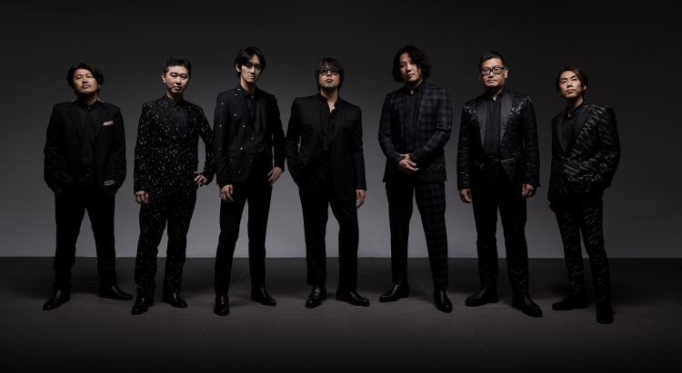 Масаёси Ёкояма (в центре)